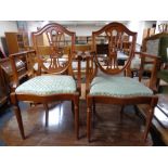 A set of six contemporary shield back dining chairs