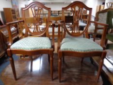 A set of six contemporary shield back dining chairs