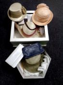 Two boxes containing lady's summer hats,