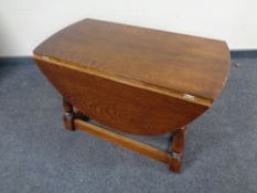 An oak drop leaf coffee table