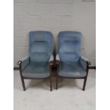 A pair of 20th century beech framed armchairs in blue upholstery