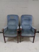 A pair of 20th century beech framed armchairs in blue upholstery