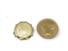 Two silver coin brooches