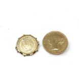 Two silver coin brooches