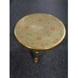 An Islamic enamelled brass circular stool