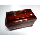 A George III inlaid mahogany tea caddy with fitted interior