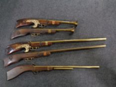 Five brass and wood ornamental muskets