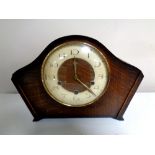 An early 20th century Smiths oak mantel clock