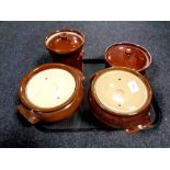 A tray of English brown glazed earthenware pots