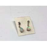 A pair of opal effect earrings