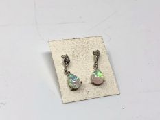 A pair of opal effect earrings