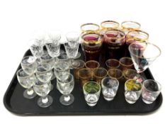 A collection of vintage glass to include ruby tinted tumblers, cut crystal sherry glasses,
