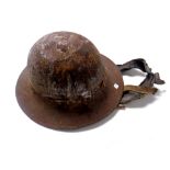 A World War II tin helmet