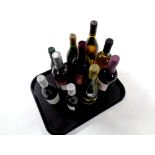 A tray containing ten assorted bottles of alcohol including First Cape Shiraz Rose, Red Mulled Wine,