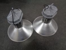 A pair of industrial style light fittings,