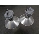 A pair of industrial style light fittings,