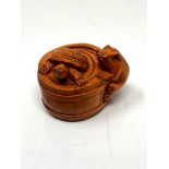 A carved Chinese hardwood netsuke - Turtle and frog in barrel