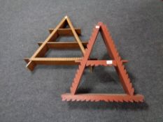 Two triangular wall shelves together with a mahogany wine table with a leather inset panel