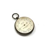 An antique pocket barometer by Negretti and Zambra in silver case, London 1908.