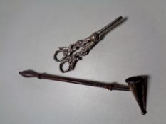 A silver candle snuffer together with a pair of silver plated grape scissors