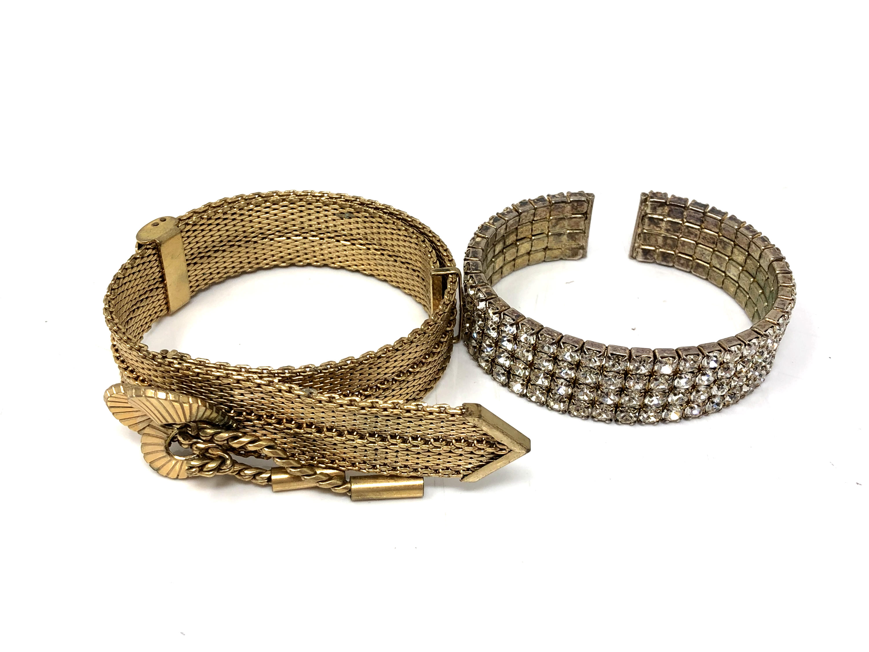 A gold plated bracelet and cuff bracelet
