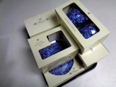 A tray of boxed Ringtons blue and white chintz china (7)