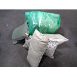 A quantity of cushions (Q)