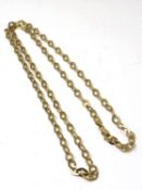 A long gold plated chain on silver