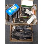 Two boxes containing a quantity of model railway track,