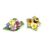 Two ceramic posy brooches