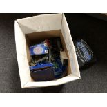 A box containing remote control helicopter, bodyelastic kit,