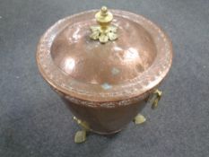 An Arts and Crafts copper and brass coal bin