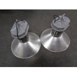 A pair of industrial style light fittings,