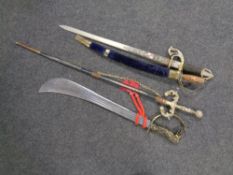 An Indian sabre in velvet scabbard together with three further ornamental swords