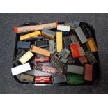 A tray containing a quantity of die cast locomotive carriages, fuel trucks etc including Hornby,