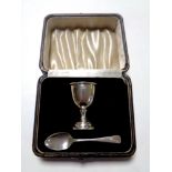 A silver christening cup and spoon in fitted box