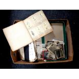 A large box of mixed ephemera including photographs, military prints,