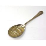 A silver plated berry spoon