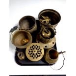 A tray of assorted brassware including trivet, pots, kettle,