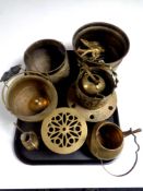 A tray of assorted brassware including trivet, pots, kettle,