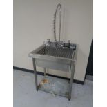 A stainless steel commercial sink