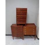 Three 20th century teak chests of drawers