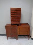 Three 20th century teak chests of drawers