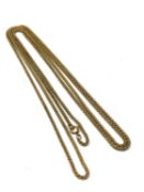 A gold plated long guard chain