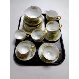 A tray containing approximately 26 pieces of Shelley Daffodil Time tea china