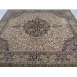 A machine made Persian design carpet,