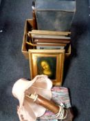 A box containing leather luggage case, pictures and prints,