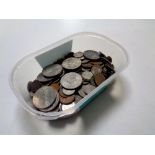 A tub containing a quantity of pre decimal coinage, crowns,
