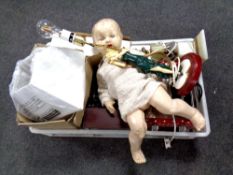 A box containing table lamp bases, vintage doll,