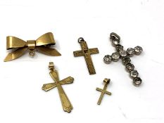 A quantity of crucifix pendants,